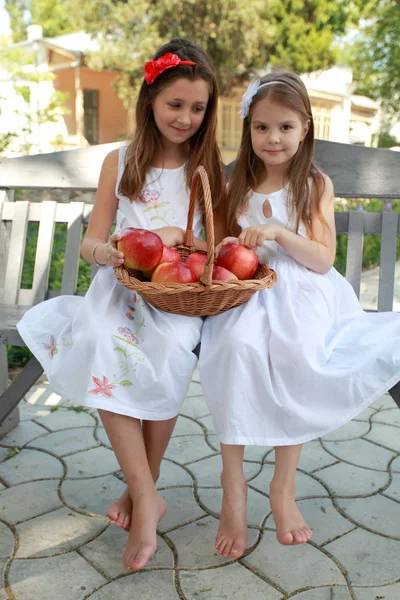 Portrait of lovely girls with red apples — Stock Photo, Image