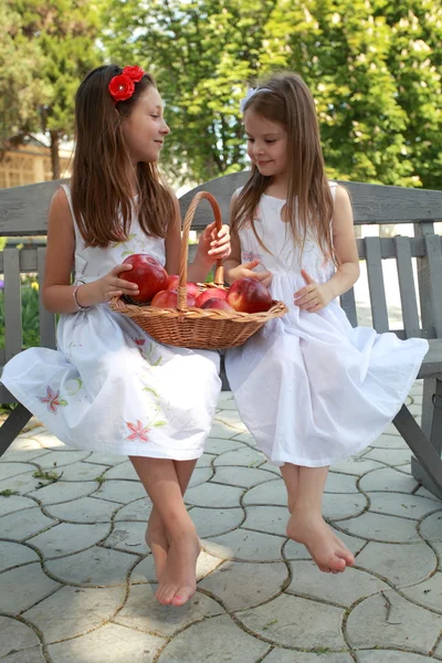 Portrait of lovely girls with red apples — Stock Photo, Image