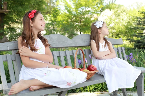 Portrait of lovely girls with red apples — Stock Photo, Image