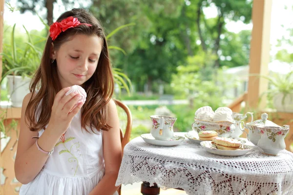 Outdoor image of beautiful little girls with tea — Stock Photo, Image