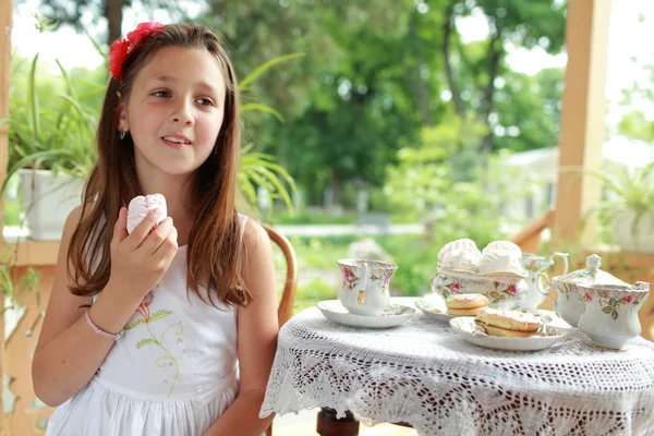 Outdoor image of beautiful little girls with tea — Stock Photo, Image