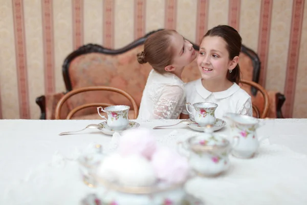 Beautiful little girls with tea — Stock Photo, Image