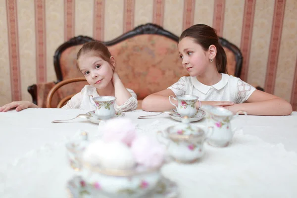 Beautiful little girls with tea — Stock Photo, Image