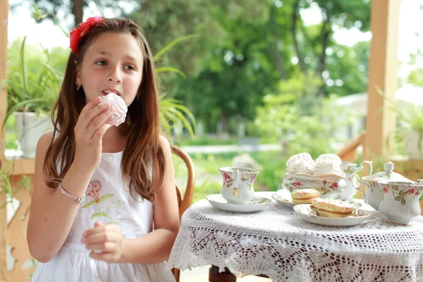 Outdoor image of beautiful little girls with tea — Stock Photo, Image