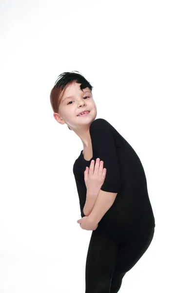 Junge Ballerina auf weißem Hintergrund auf Schönheit und Mode schöne Mädchen in schwarzem Ballettkostüm in einer Tanzpose — Stockfoto