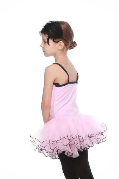 Cheerful smiling little girl in a tutu dancing on isolated white on Beauty and Fashion — Stock Photo, Image