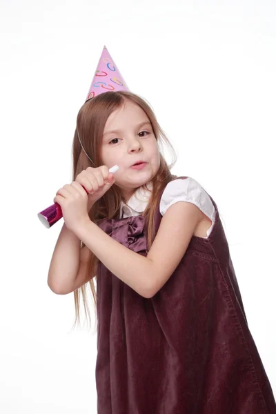 Caucasian little girl in cute dress with fife and holiday hat on white background — Stock Photo, Image