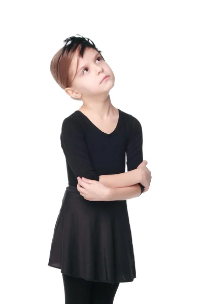 Mladá baletka na bílém pozadí na krásu a módu krásnou dívku v černém baletní kostým v taneční póze — Stock fotografie