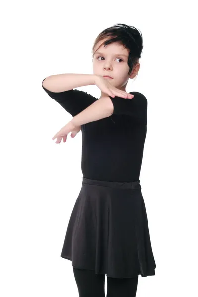 Caucasico bambina è impegnata in un danza spettacolo bianco nero vestito — Foto Stock