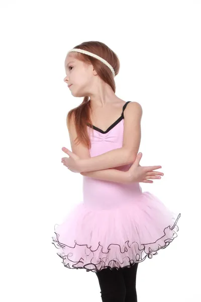 Dançarina de elegância em um traje de bailarina Imagem de estúdio de uma dançarina encantadora com cabelo bonito em um tutu rosa sorrindo e dançando em fundo branco — Fotografia de Stock