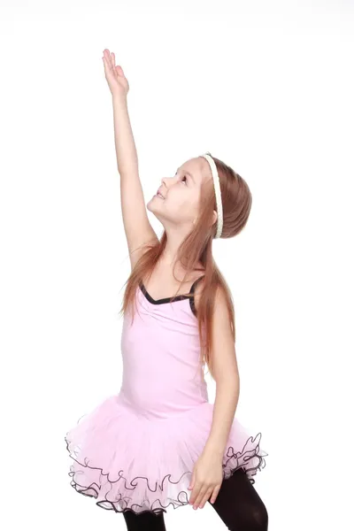 Young ballerina wearing lovely tutu dancing like a swangirl isolated over white background — Stock Photo, Image