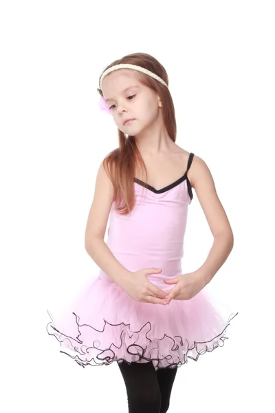 Jolie enfant exprimer ses sentiments sur la danse Mignon petit danseur de ballet avec de beaux cheveux debout dans une pose de ballet — Photo
