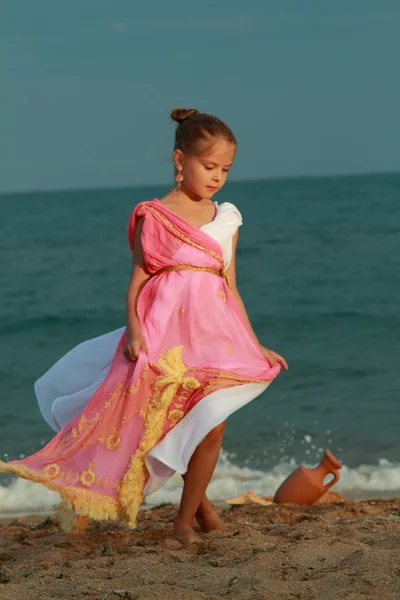 Beautiful little girl in ancient style — Stock Photo, Image