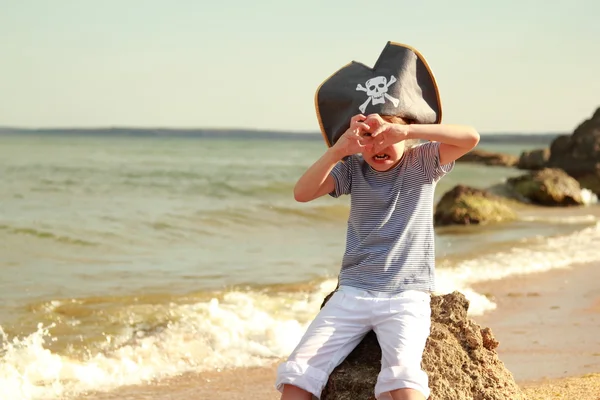 Evil little girl pirates running on the beach in summer sunny day — Stock Photo, Image