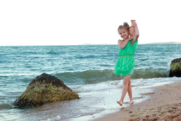 Little Greek goddess on the beach. — Stock Photo, Image