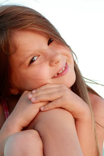 Portrait of a beautiful little girl with healthy long hair in a bathing suit on outdoors — Stock Photo, Image