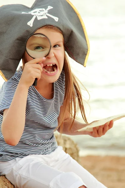 Beautiful cheerful little girl in a pirate costume — Stock Photo, Image