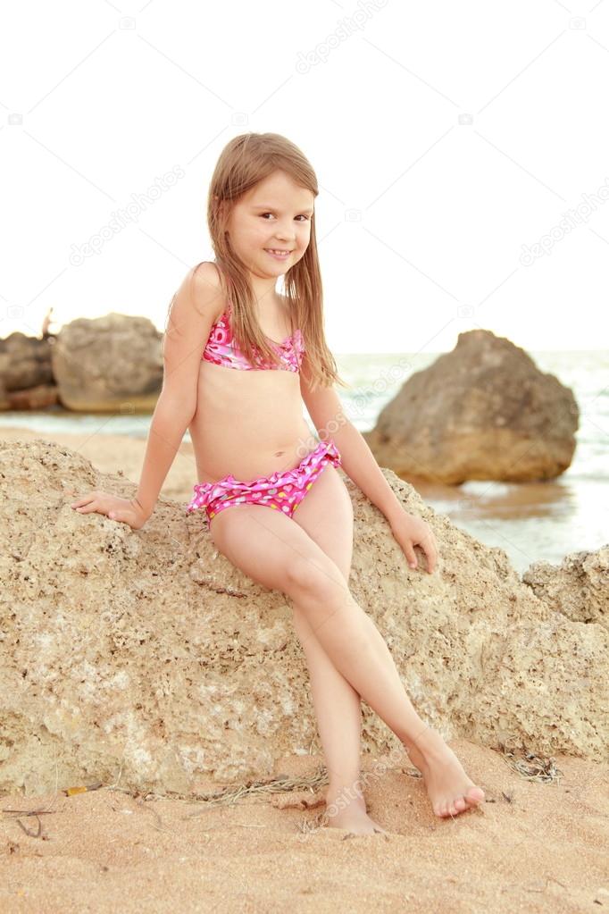 Young Girl On The Beach