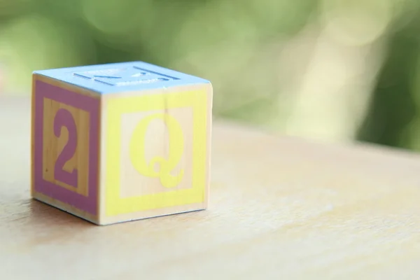 Kids wooden blocks spelling — Stock Photo, Image