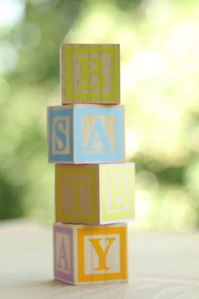 Alphabet for easy learning at a young age. Kids wooden blocks spelling — Stock Photo, Image