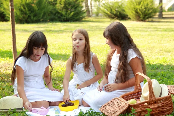 Cute little girls playing with toys — Stock Photo, Image