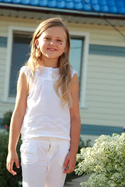 Adorable little girl with long hair — Stock Photo, Image