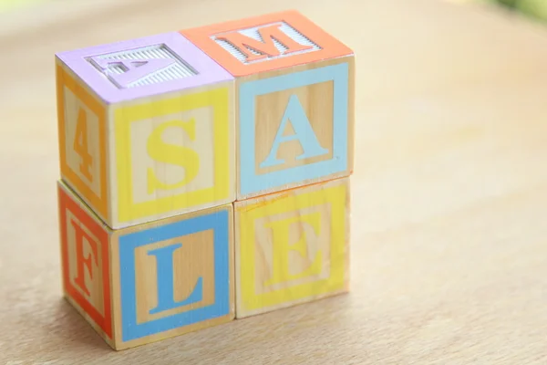 Kids wooden blocks spelling — Stock Photo, Image