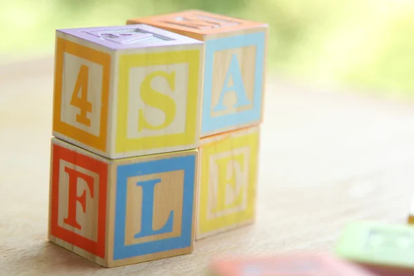 Děti dřevěné bloky pravopis — Stockfoto