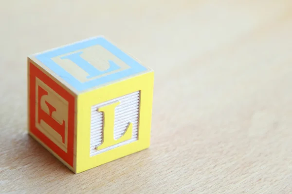 Kids wooden blocks spelling — Stock Photo, Image