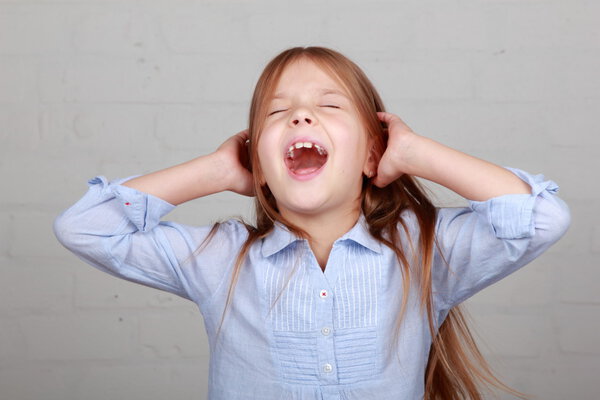 Angry little girl growls