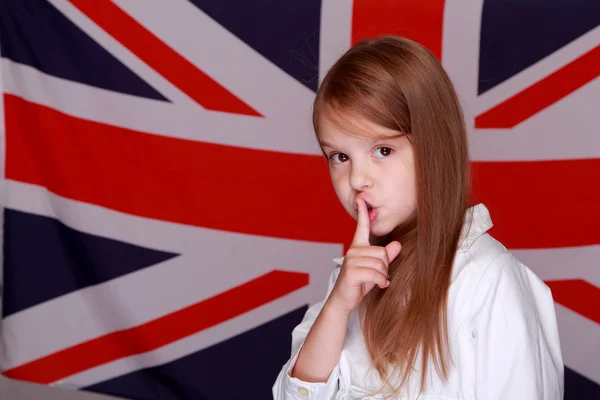 Girl on the background of the flag of Great Britain — Stock Photo, Image