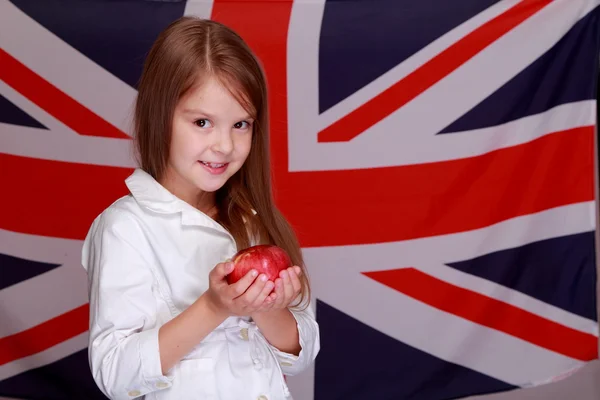 Girl on the background of the flag UK — Stock Photo, Image