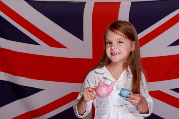 Fata pe fundalul steagului UK — Fotografie, imagine de stoc
