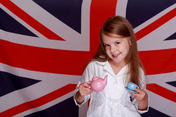 Kızı arka plan bayrak üzerinde İngiltere'de — Stok fotoğraf
