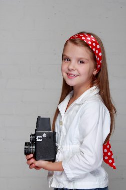 kamera ile küçük kız
