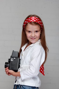 kamera ile küçük kız