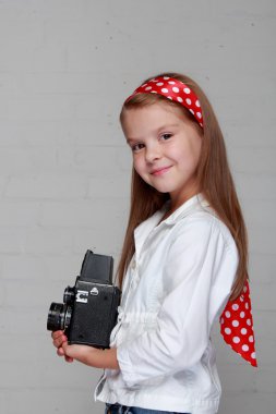 kamera ile küçük kız