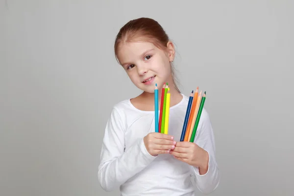 Girl with colored pencils — Stock Photo, Image