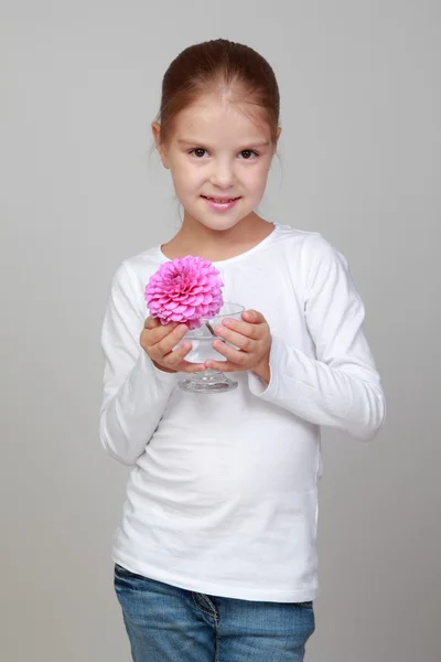 Girl holding fresh pink dahlias — Stock Photo, Image