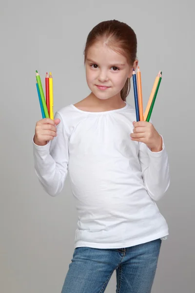 Girl with colored pencils — Stock Photo, Image