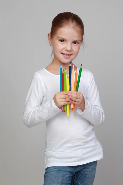 Kız öğrenci holding kalem çizim — Stok fotoğraf