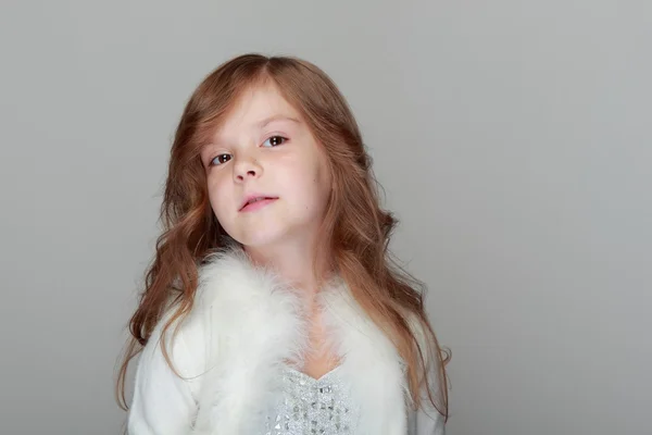 Child on gray background — Stock Photo, Image