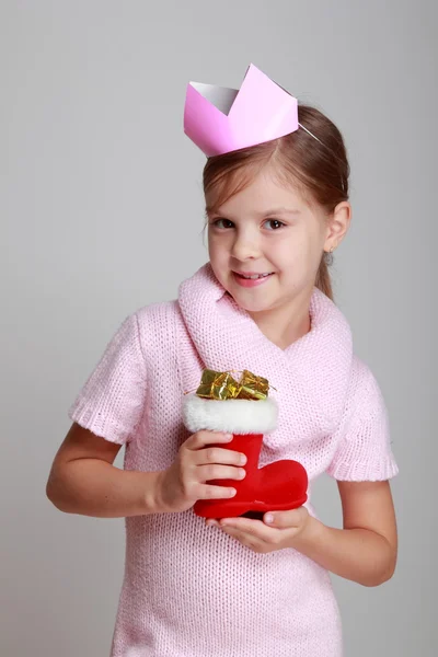Child holding Christmas boot — Stock Photo, Image