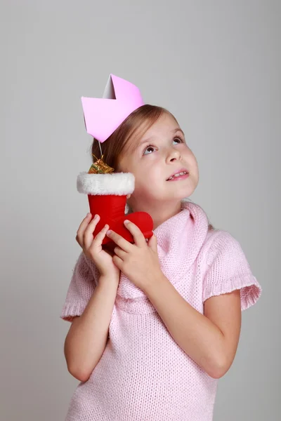 Child holding Christmas boot — Stock Photo, Image