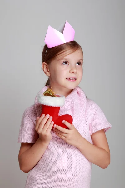 Girl holding Christmas boot — Stock Photo, Image