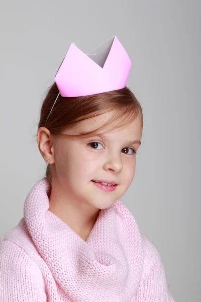 Girl in a pink knitted dress — Stock Photo, Image