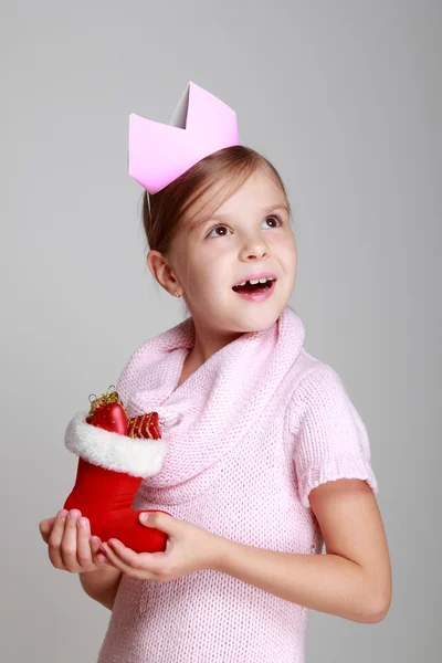 Girl holding Christmas boot — Stock Photo, Image