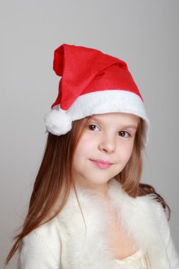 Noel Baba'nın şapkalı kız