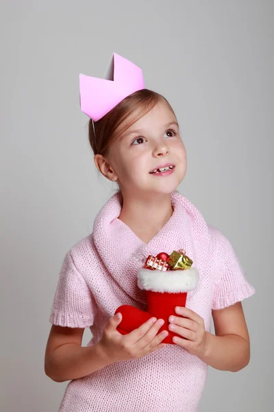 Girl holding Christmas boot — Stock Photo, Image