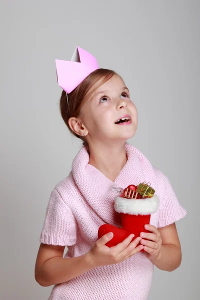 Girl holding Christmas boot — Stock Photo, Image